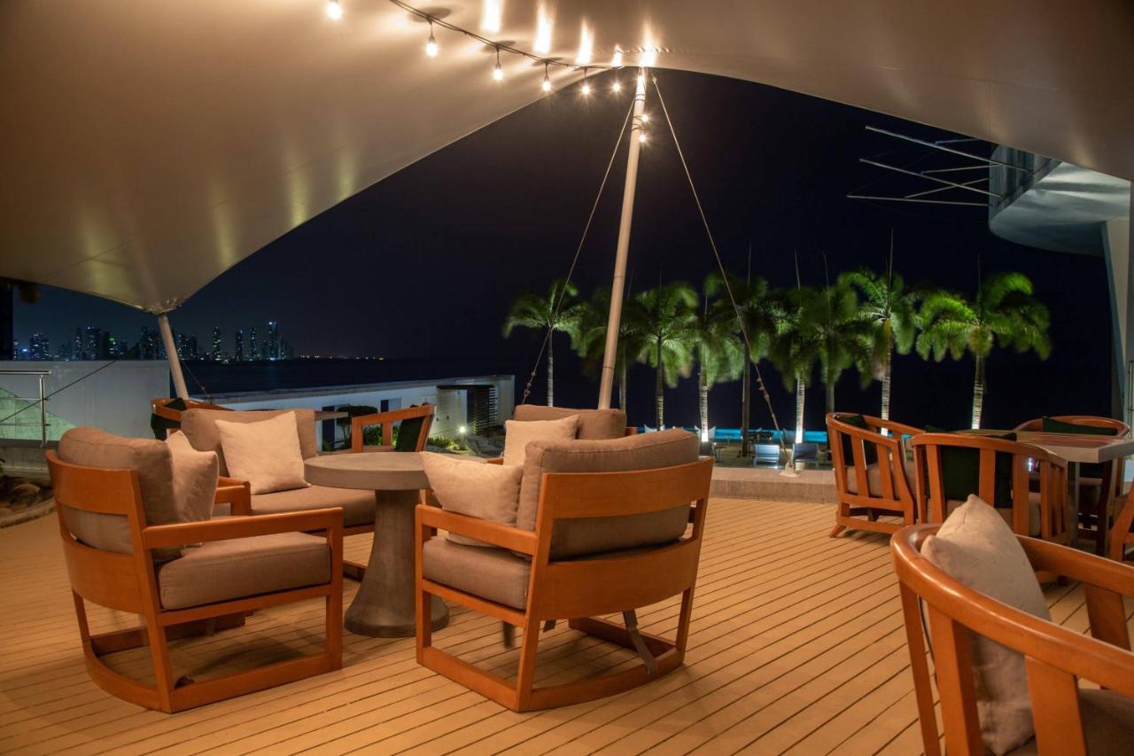 Executive suite king bed balcony partial ocean view