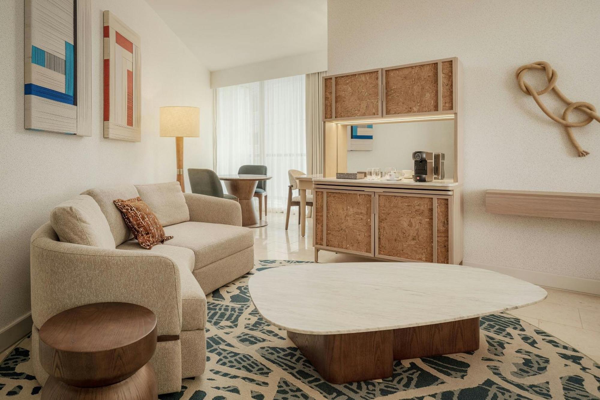 Executive suite king bed balcony partial ocean view