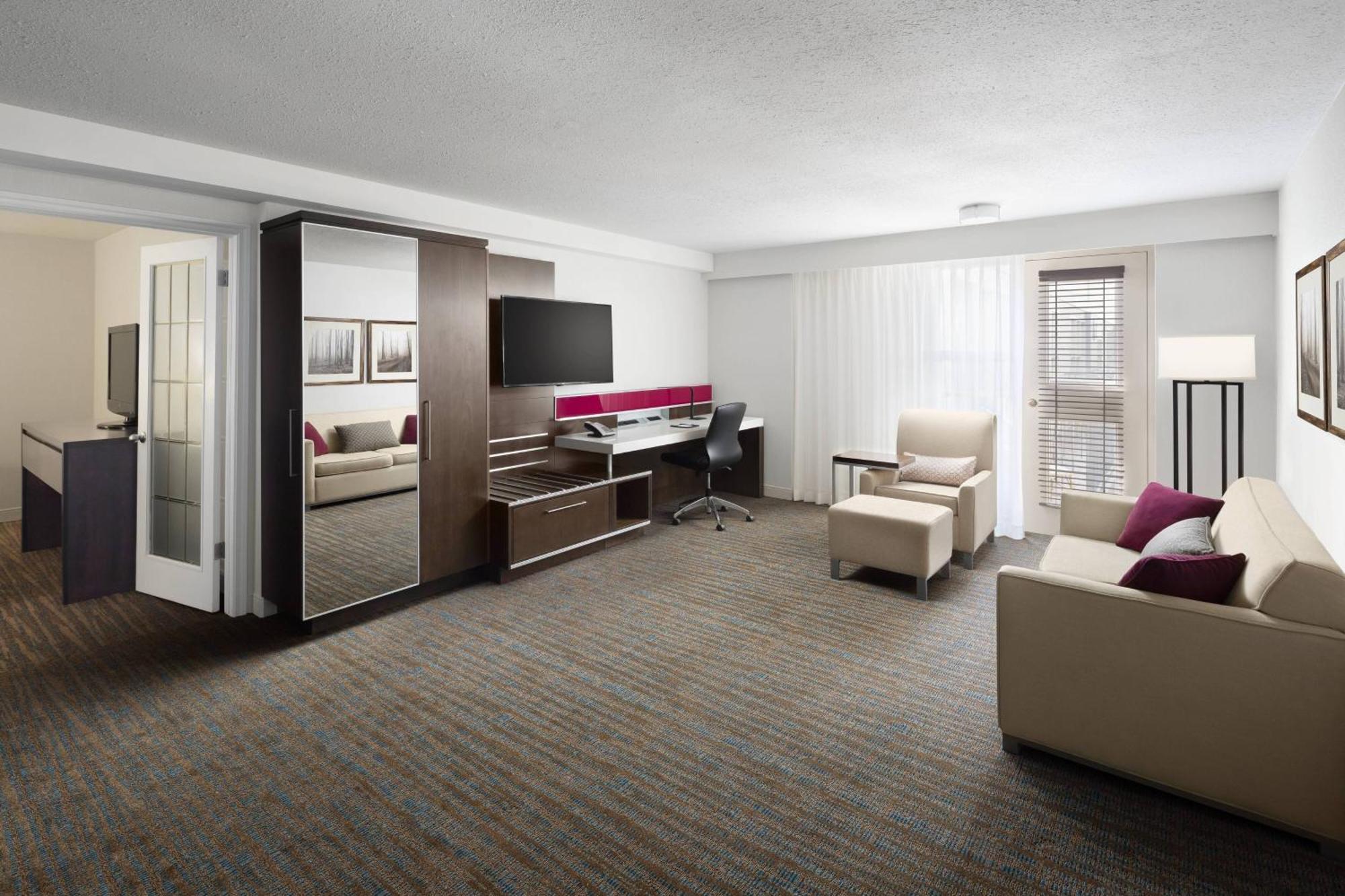 One-Bedroom Executive King Suite One King Bed Sofa Bed Atrium View