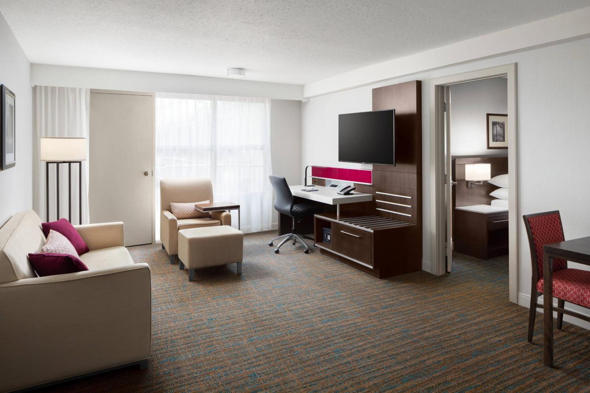 One-Bedroom Executive King Suite One King Bed Sofa Bed Atrium View